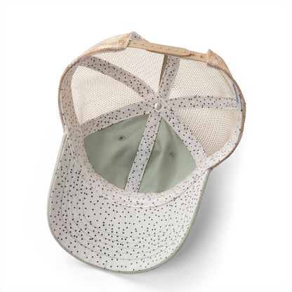Running Mom Cap in Sage/Polka Dots, underbrim detail — polka dot print lining close-up