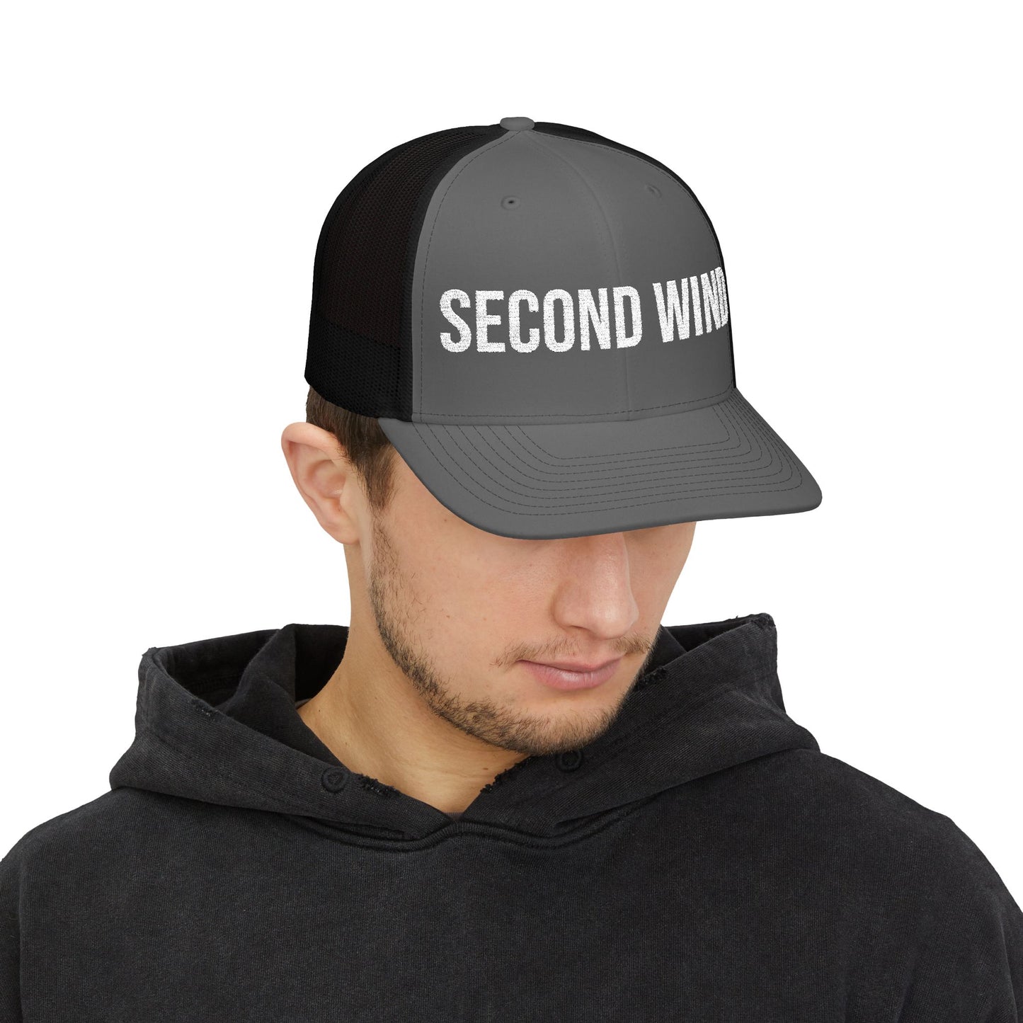 Second Wind Trucker Cap in Charcoal/Black worn by model — embroidered snapback hat