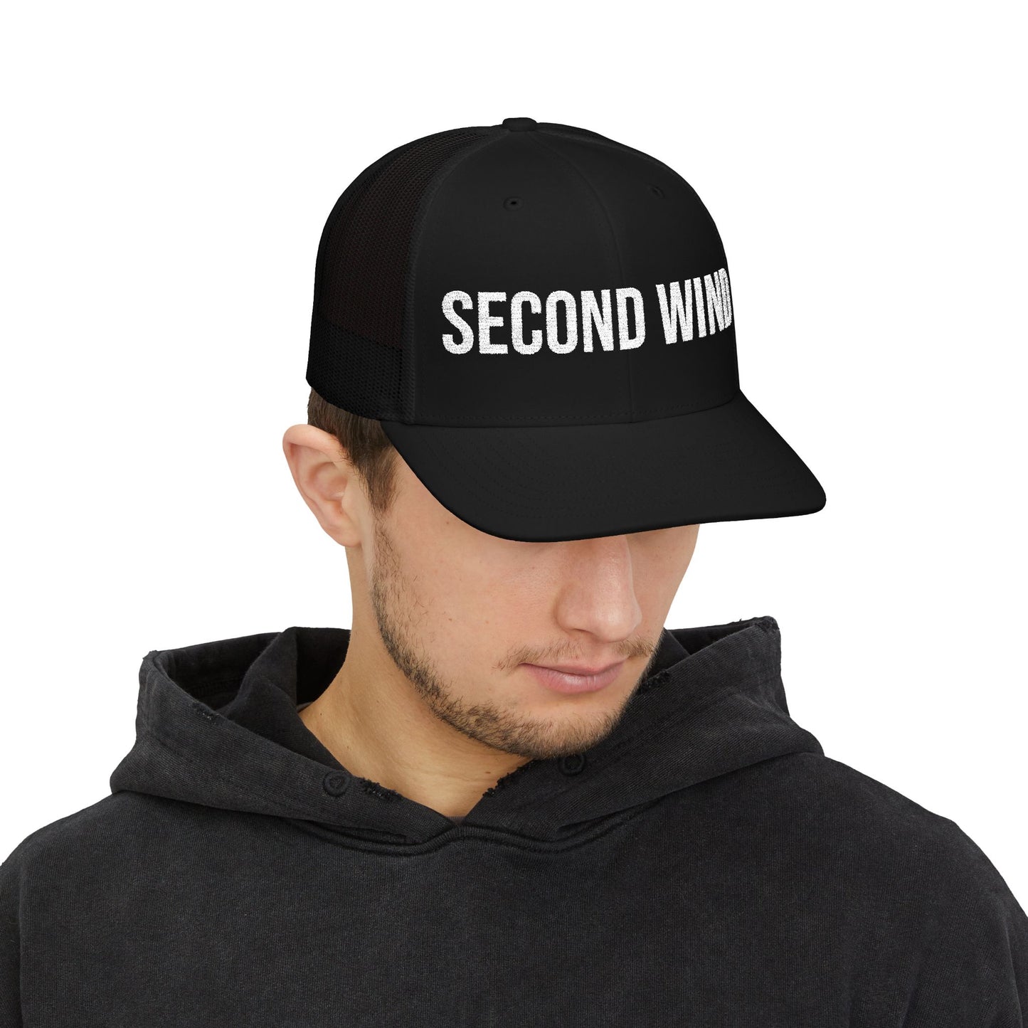 Second Wind Trucker Cap in Black worn by model — embroidered mesh-back snapback hat