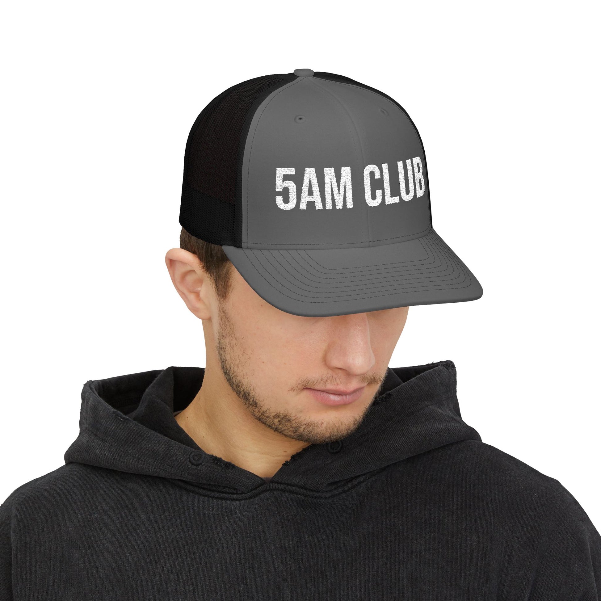 5AM Club Trucker Cap in Charcoal/Black worn by model — embroidered mesh-back snapback
