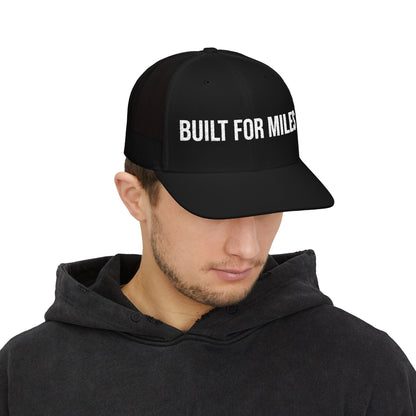 Built For Miles Trucker Cap in Black worn by model — embroidered snapback hat for drivers