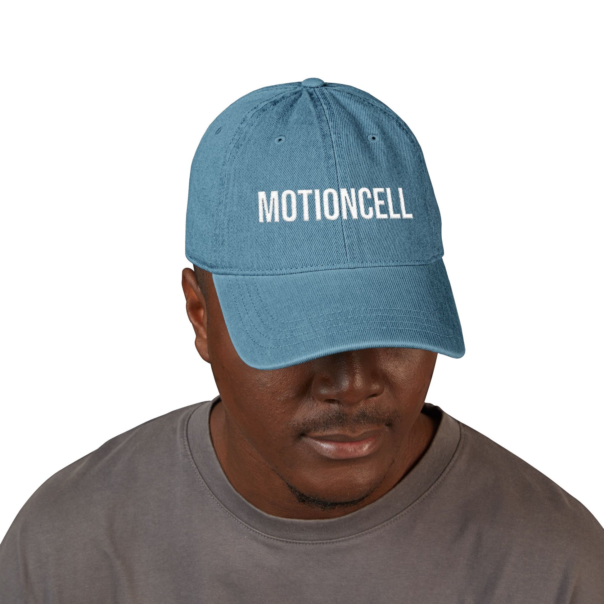 MotionCell embroidered denim cap worn on model