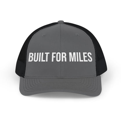 Built For Miles embroidered front panel detail - flat thread trucker cap close-up